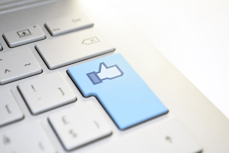 Facebook thumbs up photo for social media data blog social media industry benchmarks