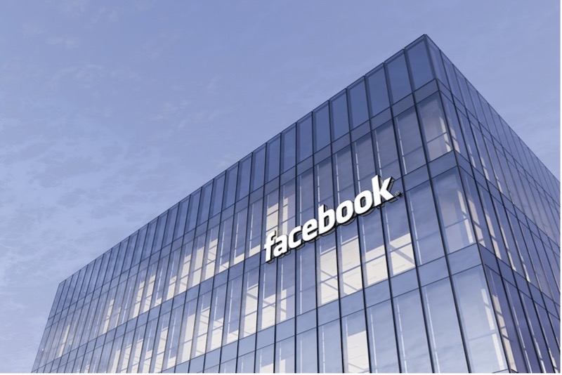 Facebook social media reach logo on building